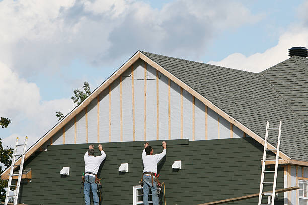 Professional Siding technician working in Huntsburg, OH